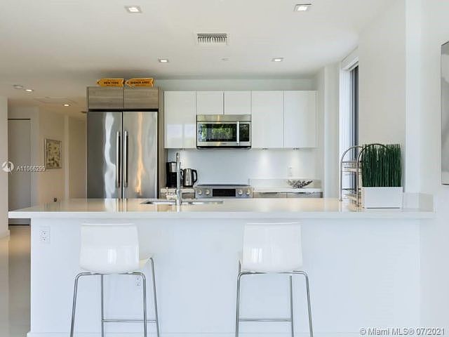 1st image of 9940 W Bay Harbor Dr #3A