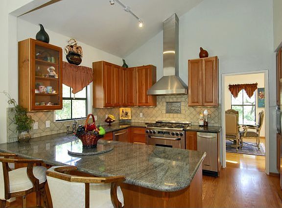 Remodeled granite kitchen, solid cherry cabinets