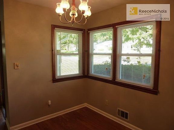 Formal dining room with wood floors