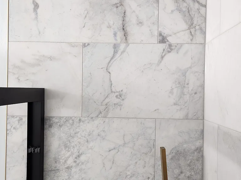 Both upstairs bathrooms' shower walls have the most elegant marble you'll find. I still find myself just staring at it sometimes because it's so beautiful.