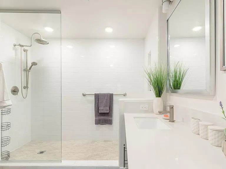 This is the private ensuite master bathroom. Luxury rain showers are a highlight for all bathrooms throughout the home.