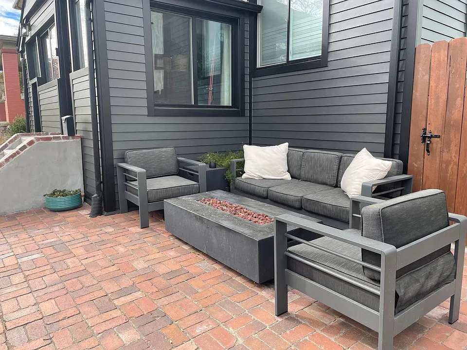 Front patio, this furniture and firepit come with the house if wanted. area is shared with basement tenant.