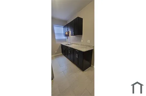 1136 W 68th St #1 Photo 1