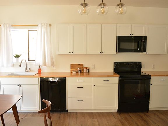 The kitchen, dining room and living room are all open concept.