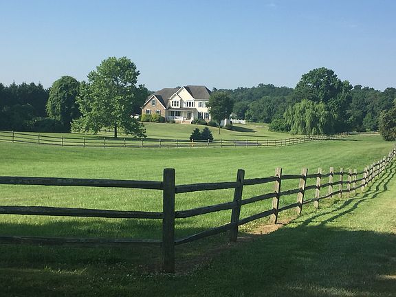 Road View-Pasture and House