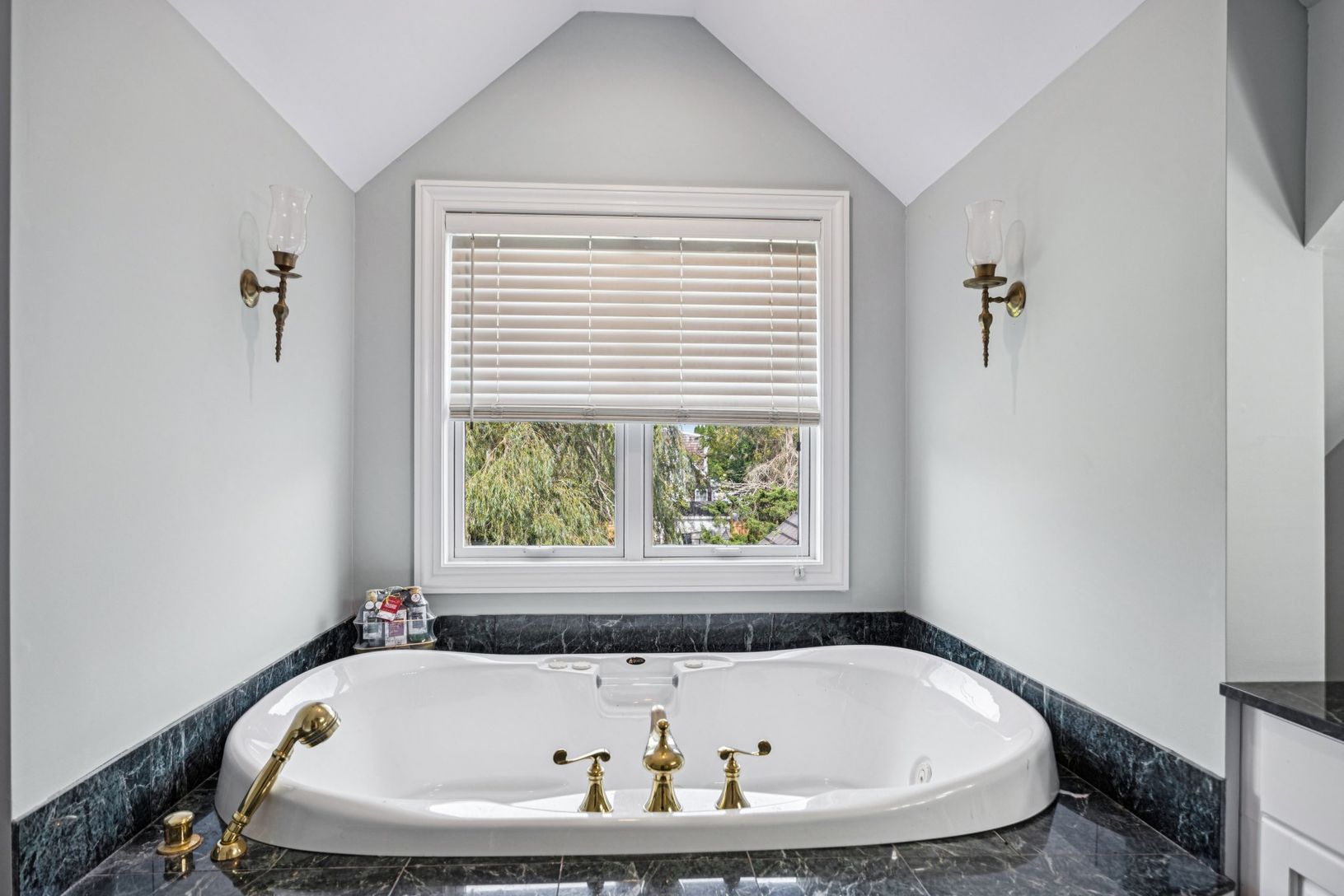 Primary bath featuring a whirlpool jetted tub.