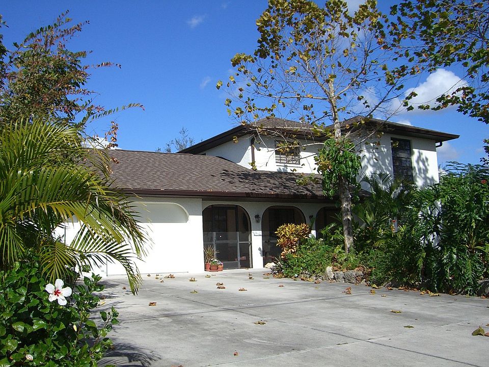 Front View, mature landscaping