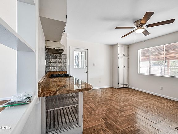 Kitchen showing dining area.