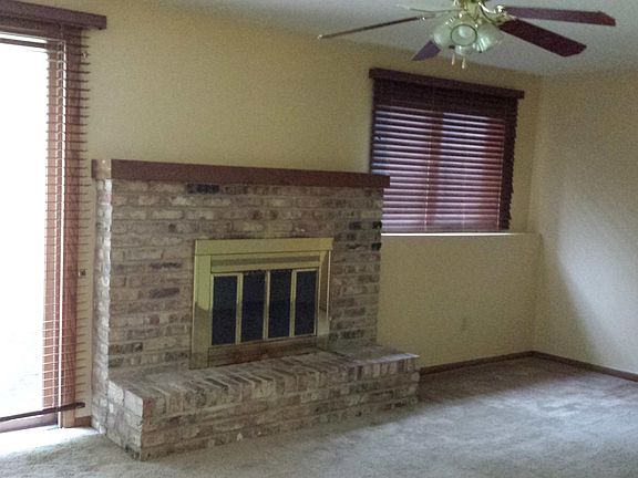 Sliding Patio Door to West, Cozy Family Room with Blinds and