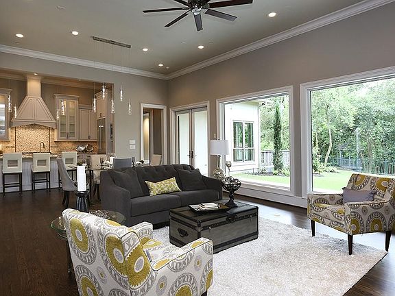 The open concept living provides great views of the large covered patio and the lush ravine. The cov