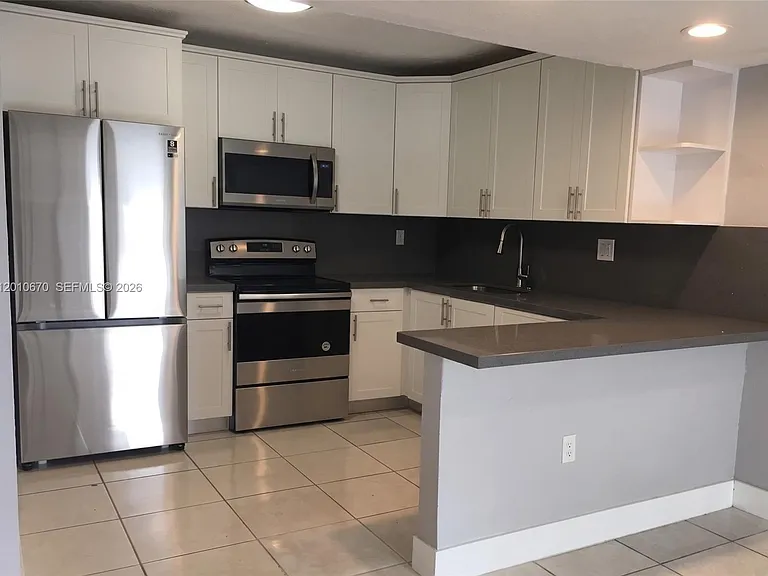 8888 SW 131st Ct #406 — Photo 5