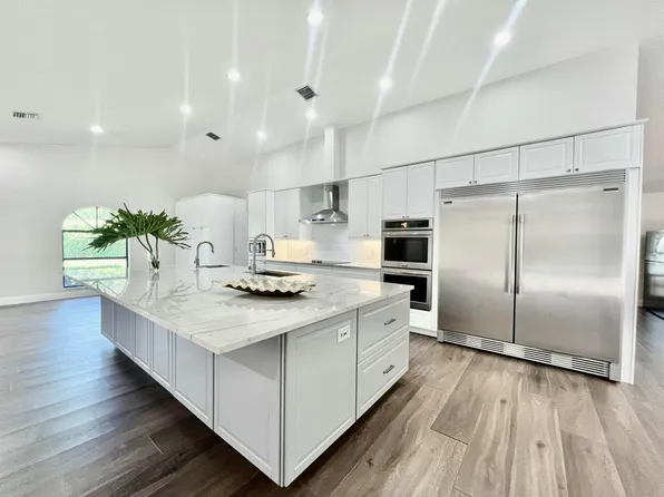 104 Greenbrier Court, Atlantis, FL 33462