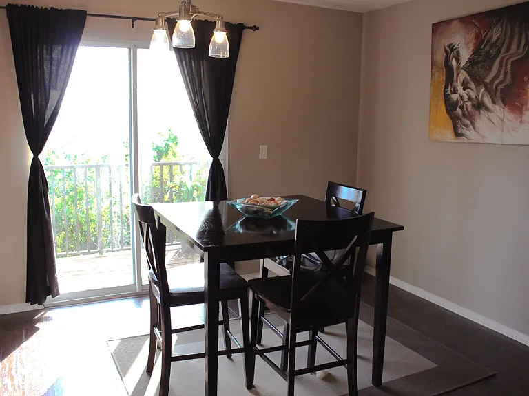 Screened in balcony off dining room on first floor