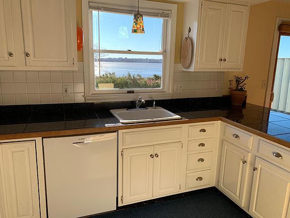 Kitchen view with dishwasher