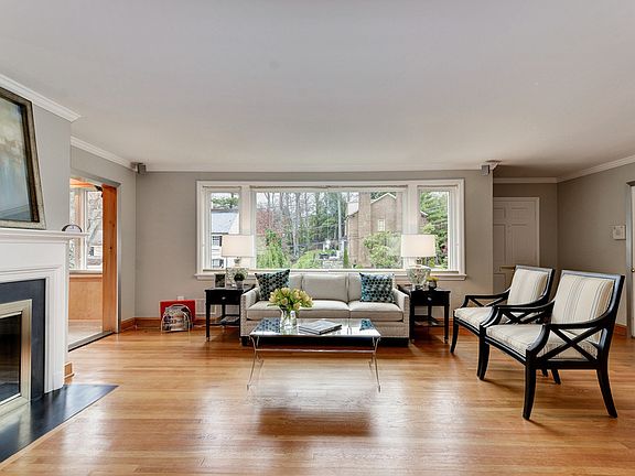 Wall of Windows Floods Living Room with Light