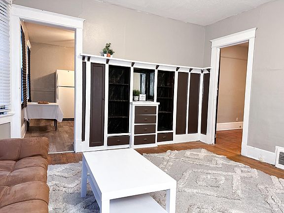 Living room to kitchen and bedroom