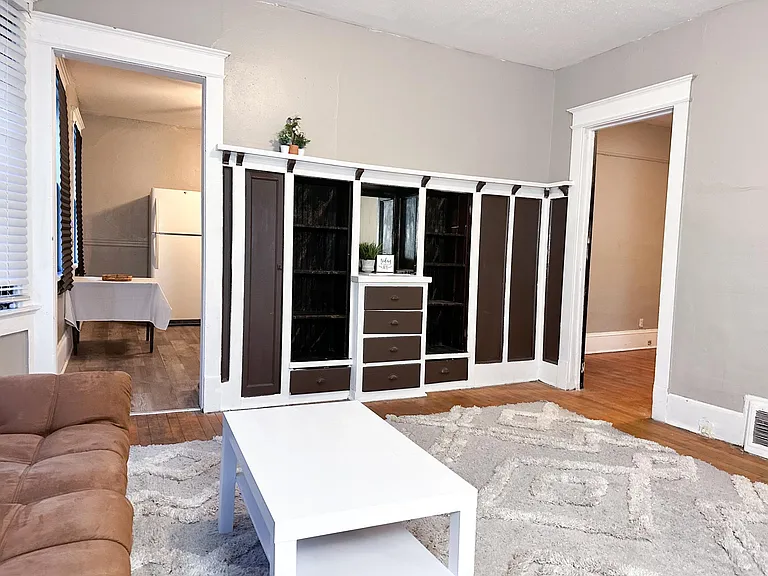 Living room to kitchen and bedroom