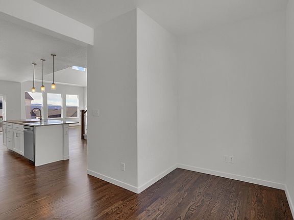 Flex space just off the kitchen. Photo representing home to be built and may demonstrate optional f