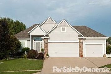 Morning sun warms our house from East
						:
						Three car garage with door openers and storage above. Go thru laundry to enter.