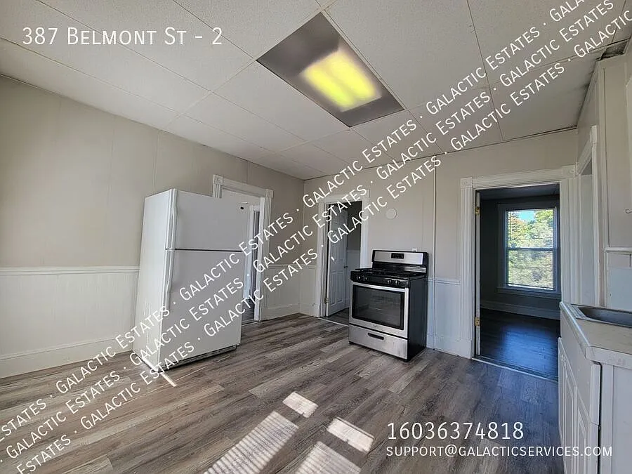 3 bed 1 bath 2nd floor apartment with deck, 3 season room, and large storage room — Photo 3