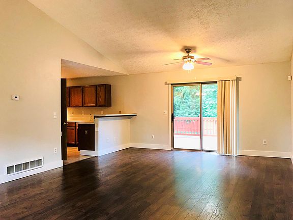 Great room opens to kitchen and deck