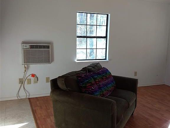 Tile and laminate flooring make this home easy to keep clean.