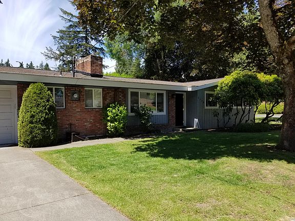 Front from driveway and sidewalk. - This is a bedroom community made up of primarily families. It is safe, clean, and walkable at any time of day or night. It's wonderful! Recreation of any kind is minutes away. Public transpo is a few blocks walk away. B