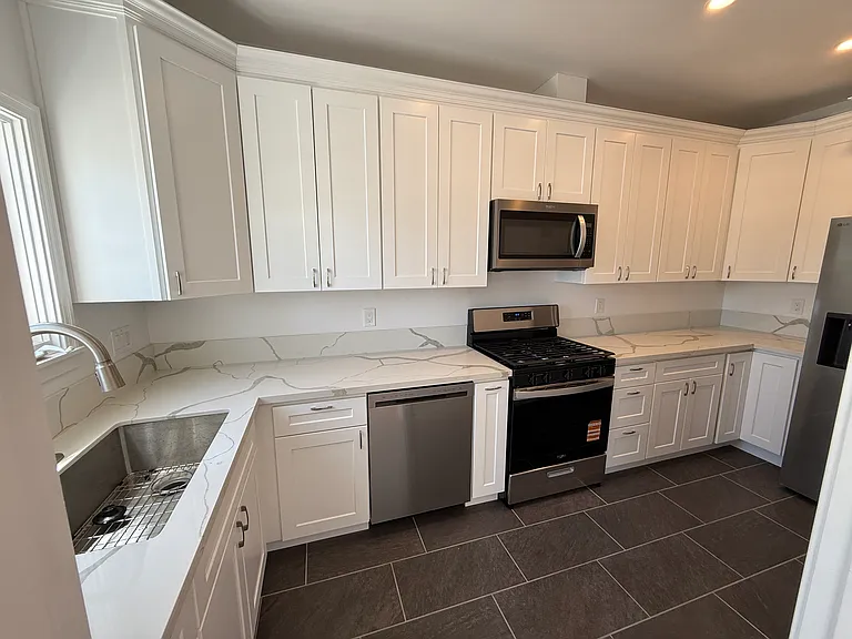 Extremely Large Fully Upgraded Kitchen with Top Brand All-New Appliances Including 25 Cubic Feet Refrigerator, 5-Burner Range, Dishwasher, Over The Range Microwave