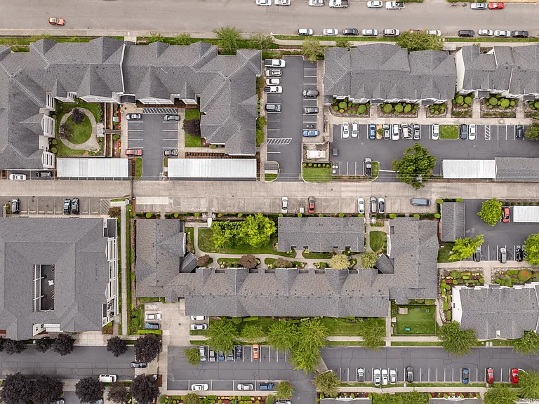 Thoughtfully designed community with open green spaces and parking.