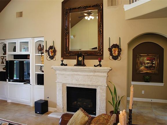 Cast stone gas log fireplace