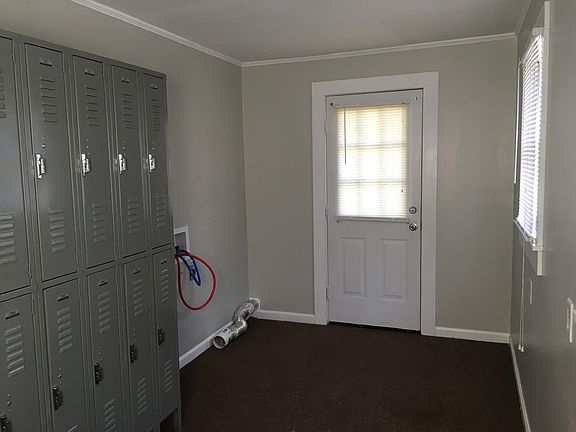 Laundry/Pantry/Mud Room with entrances from deck at back and