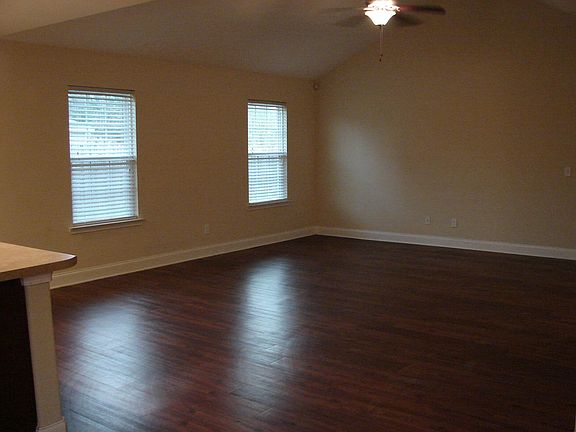 Spacious living room with beautiful hardwood floors!