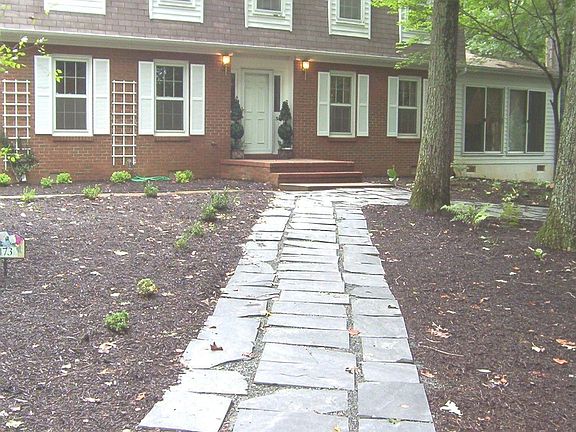 Gorgeous landscaping welcomes you and your guests