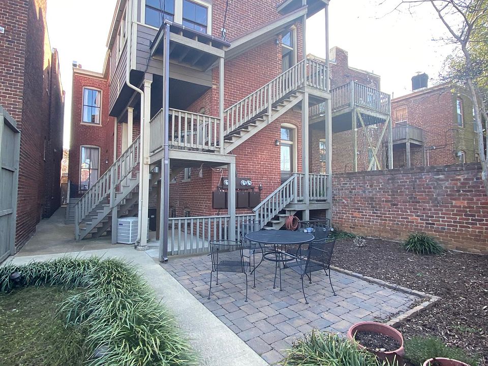 Stairway to 2nd floor entrance from private parking space behind the building.