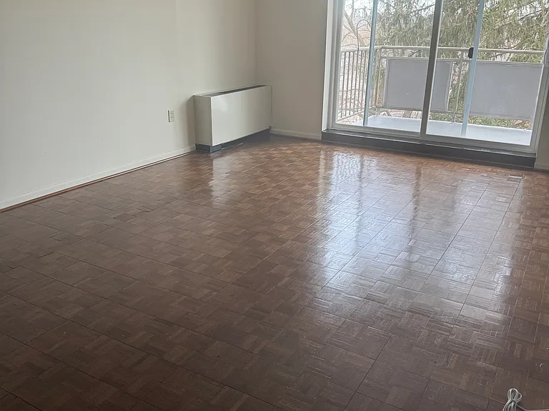 1B/1B Living Room. Large space with beautiful floors.