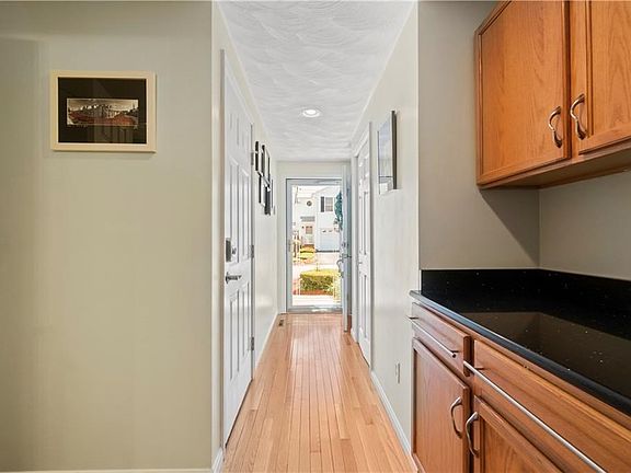 Entry - Door to leads to the garage - door on the right is coat closet