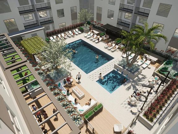 A dynamic courtyard with resort-inspired pool, layered seating, and inviting spaces to relax or connect.