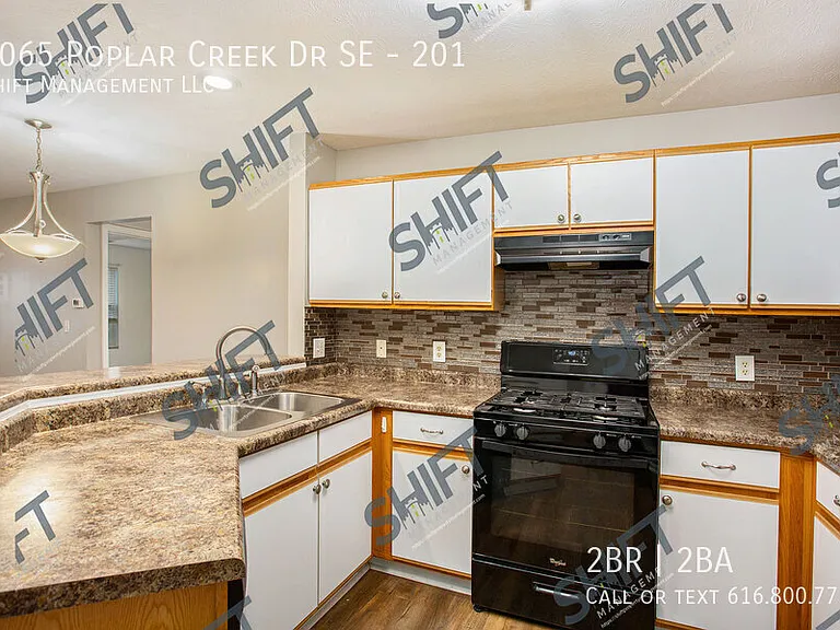 3065 Poplar Creek Dr SE #201 — Photo 11