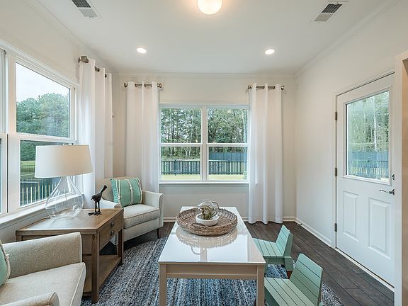 Retreat to a bright and relaxing sunroom with plenty of windows - Model Representation