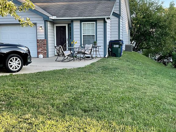 Wonderful sitting area next to flower garden