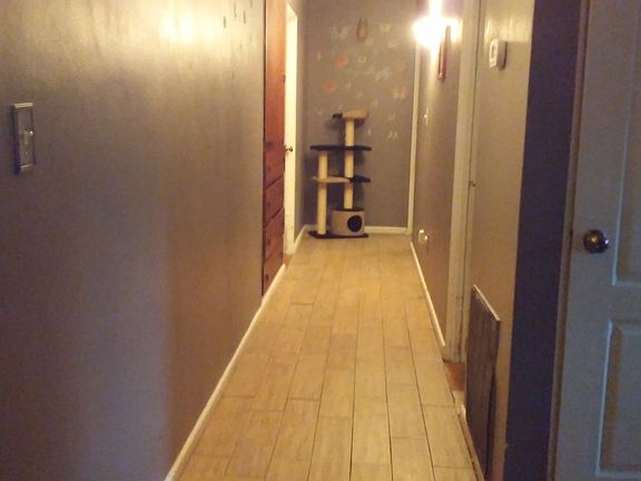 Wide hallway to bedrooms
