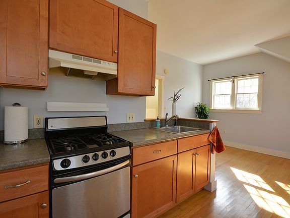 Maple Cabinetry with ample storage space and added shelving