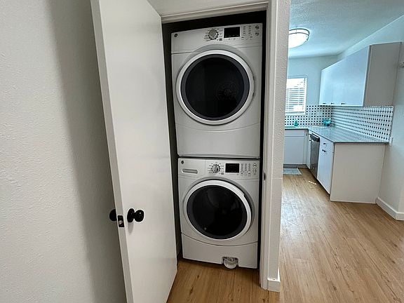Full size GE washer dryer in unit!
