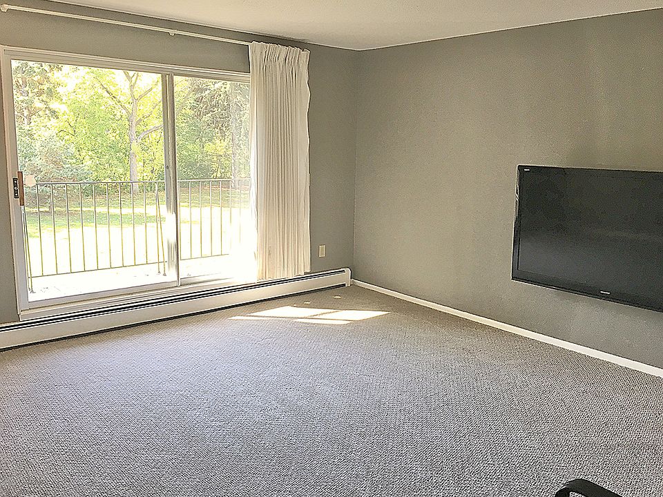 South-facing living room gets lots of natural light from the large patio doors. Large screen tv and remote are free to use for tenant.