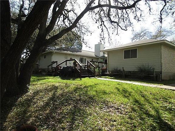 This is a yard to live in! Siding was replaced with HardiPlank in 2017 and gutters were repaired and painted at the same time.