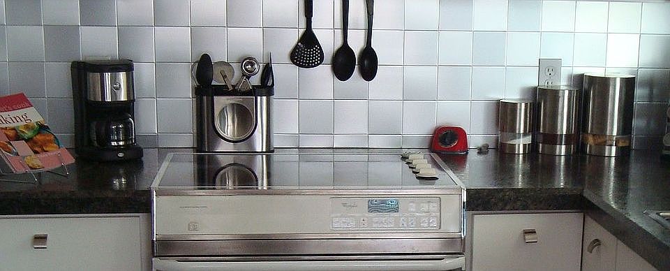 Wilsonart counter & brushed steel backsplash