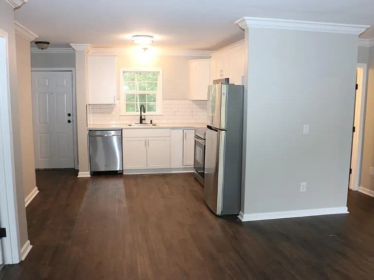 New vinyl plank flooring throughout living area and bathrooms.