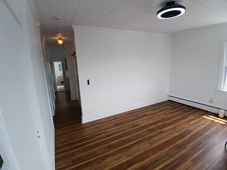 Living room and hallway to kitchen