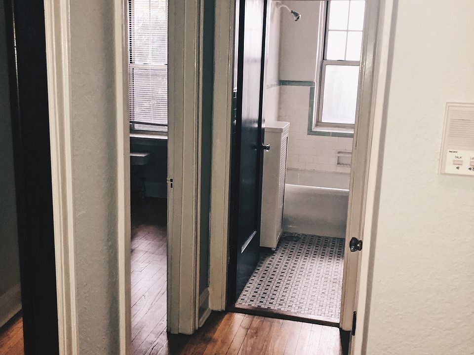 Hallway - Gray Turnover & Hardwood Floor
