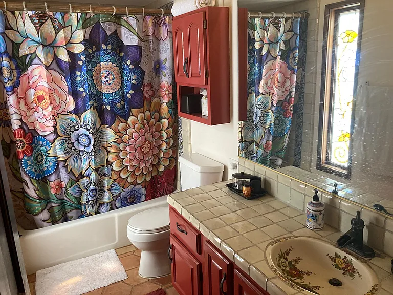 Bathroom w/ Stained Glass Window
